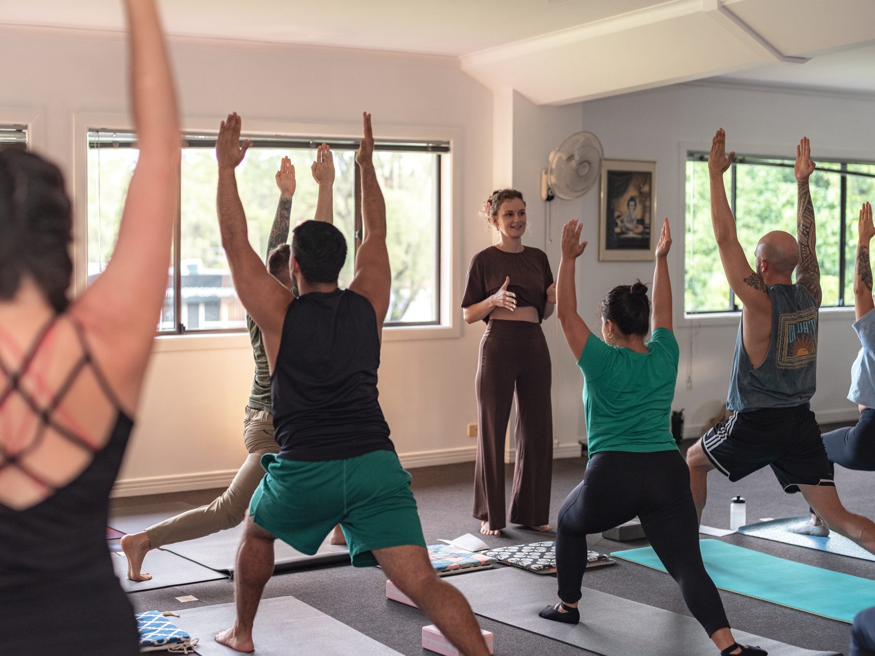 A yoga class in progress at SuperSoul Yoga Community