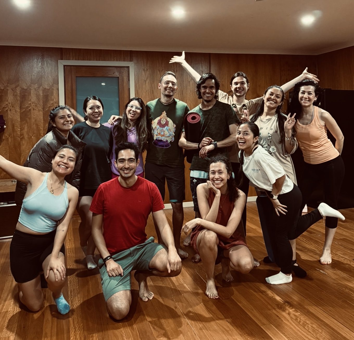 Members of SuperSoul Yoga Community posing together for a group photo